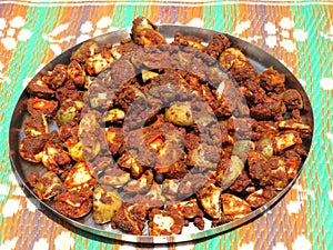 Mango pickle image, it is very testy food .