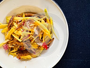 Mango salad with crispy fish