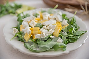Mango Salad with feta cheese and arugula