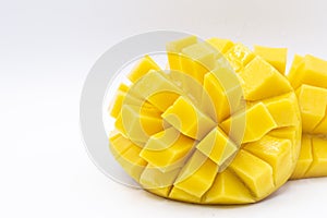 Mango slice with cubes isolated white background