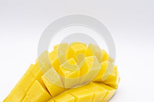 Mango slice with cubes isolated white background