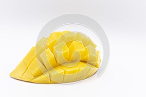 Mango slice with cubes isolated white background