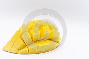 Mango slice with cubes isolated white background