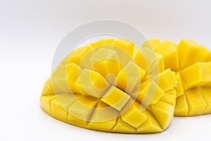 Mango slice with cubes isolated white background