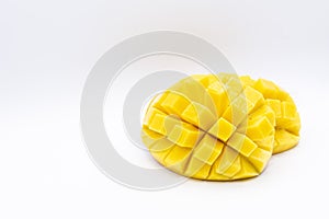 Mango slice with cubes isolated white background