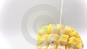 Mango slice with cubes isolated white background