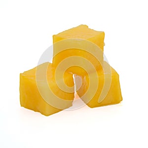 mango slice cut to cubes isolated on white