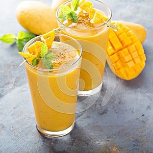 Mango smoothie in tall glasses