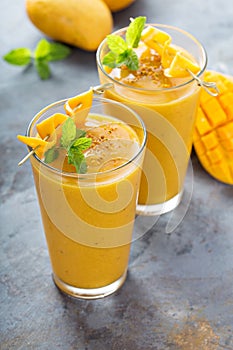 Mango smoothie in tall glasses
