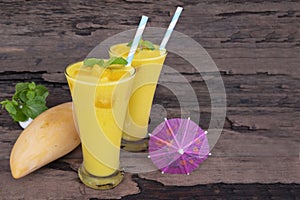 Mango smoothies juice orange fruit juice milkshake blend beverage healthy.