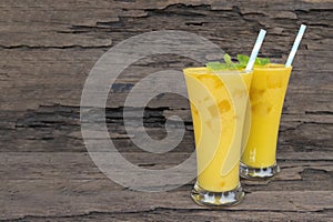 Mango smoothies yellow colorful fruit juice milkshake blend beverage healthy high .