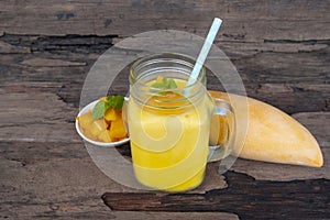 Mango smoothies yellow colorful fruit juice milkshake blend beverage healthy high .