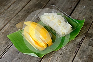 Mango sticky rice in plastic box