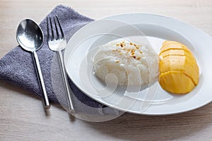 Mango Sticky Rice with white plate
