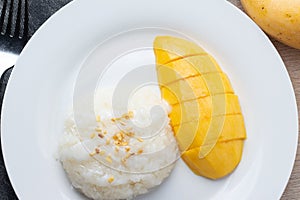 Mango Sticky Rice with white plate,dessert.