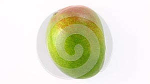 Mango whole, one, rotation counterclockwise, turning, top view, on white background
