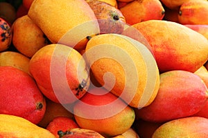 Mangoes basket, tropical fruit that grows on trees photo