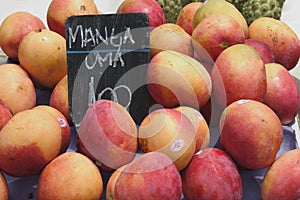 Mangos in a street market photo