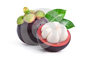 Mangosteen with cut in half and leaves