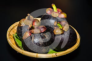 Mangosteen have purple skin and white