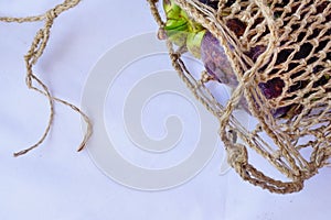 Mangosteen in traditional basket are captured isolated in top angle