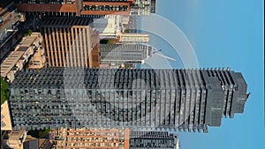 Manhattan from aerial view skyscrapers architectural marvels vertical video. Skyscrapers of Manhattan reflect essence of