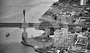 Manhattan Bridge aerial view from helicopter, New York City. City skyline from a high vantage point - NY - USA