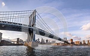 Manhattan Bridge with Brooklyn Bridge and Manhattan Skyline as background - New York, USA