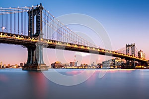 Manhattan Bridge illuminated at dusk