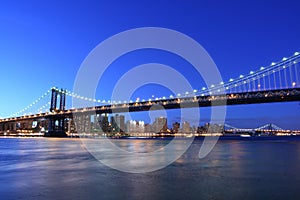 Manhattan Bridge and Manhattan skyline At Night