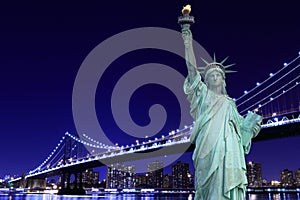 Manhattan Bridge and The Statue of Liberty at Night