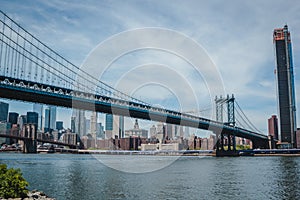 Manhattan Bridge and view on New York downtown