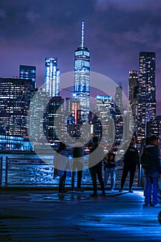 Manhattan and Brooklyn bridge night view and the people