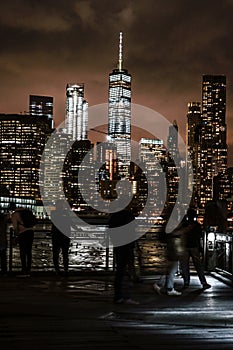 Manhattan and Brooklyn bridge night view and the people