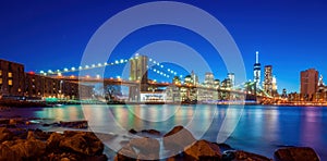 Manhattan city skyline cityscape of New York with Brooklyn Bridge