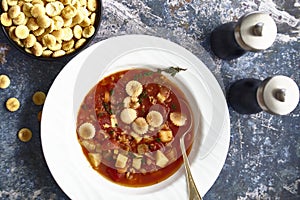 Manhattan Clam Chowder with Oyster crackers on a Flat Lay photo