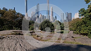 Manhattan midtown skyline panning view from Central Park South in the early morning