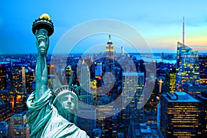 Manhattan new york city skyline statue of liberty sunset dusk night
