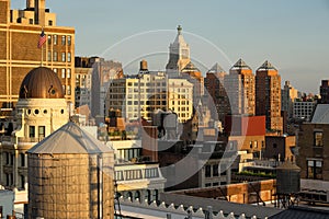 Manhattan, New York City. Sunset view of rooftops and penthouses of the Flatiron District