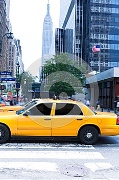 Manhattan New York 8th Av yellow taxi cab US photo