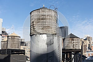 New York City rooftop water tower tankt white grey textured surface pattern