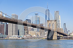 Manhattan skyline and Brooklyn Bridge in daytime