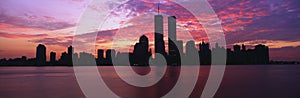 This is the Manhattan skyline from Jersey City, New Jersey at sunrise. The World Trade towers are in the center and the skyline is photo