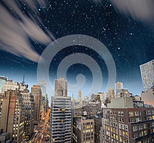 Manhattan skyline at night, aerial view of New York City