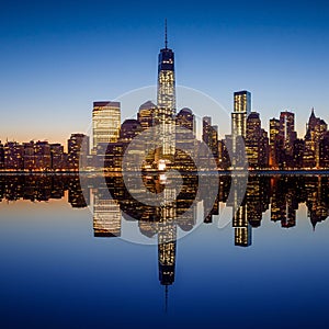 Manhattan Skyline with the One World Trade Center building at twilight photo