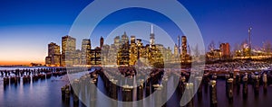 Manhattan Skyline with the One World Trade Center building at twilight