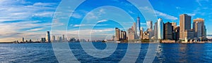 Manhattan skyline panorama at sunset . New York City