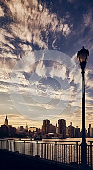 Manhattan skyline silhouette at sunset, New York