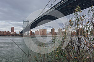 Manhattan skyline viewed from Brooklyn with Manhattan bridge, in New York City, USA