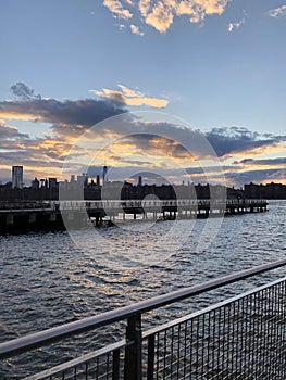 Manhattan skyscrapers view from the water, modern architecture of New York City landscape from the waterfront